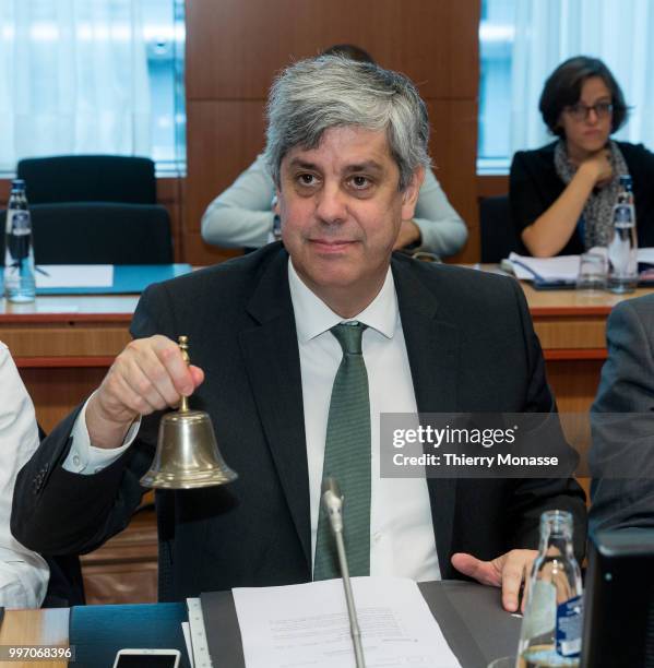 Portuguese Finance Minister, President of the group Mario Centeno calls his colleague prior an Eurogroup Ministers meeting on july 12 in the Justus...