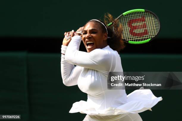 Serena Williams of The United States plays a backhand against Julia Goerges of Germany during their Ladies' Singles semi-final match on day ten of...