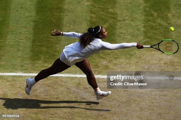 Serena Williams of The United States plays a backhand against Julia Goerges of Germany during their Ladies' Singles semi-final match on day ten of...