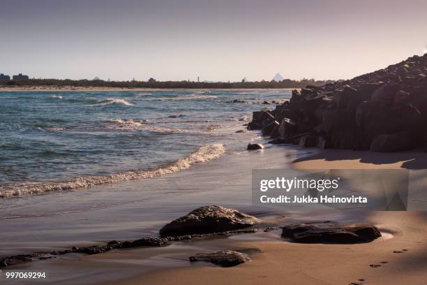 sunrise on the beach - heinovirta stock-fotos und bilder