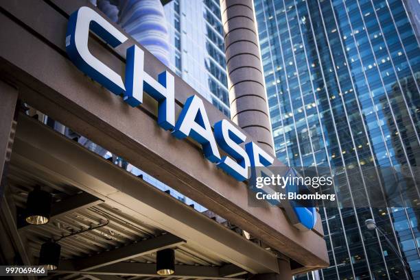 Signage is displayed outside a JPMorgan Chase & Co. Bank branch stands in Chicago, Illinois, U.S., on Tuesday, July 10, 2017. JPMorgan Chase & Co. Is...