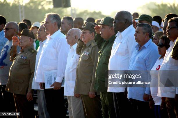 Cuban President Raul Castro takes part in a ceremony to honour Argentine Marxist revolutionary Ernesto Che Guevara, on the 50th anniversary of his...