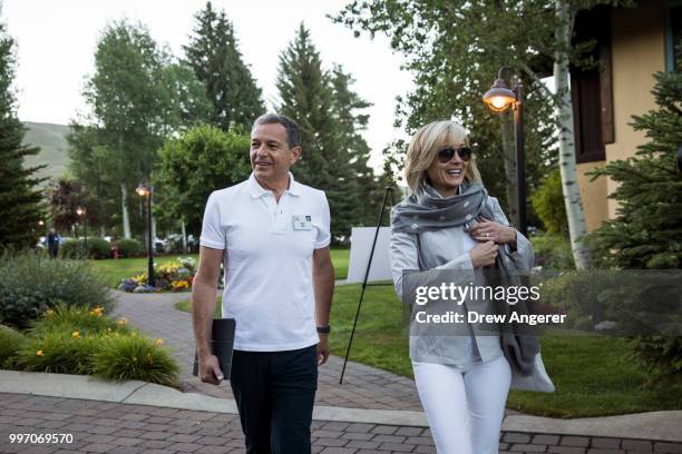 Bob Iger, chairman and chief executive officer of The Walt Disney Company, and his wife journalist Willow Bay attend the annual Allen & Company Sun...