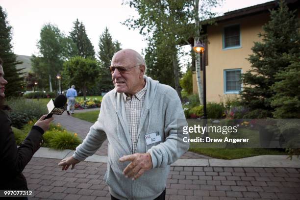 Barry Diller, chairman of IAC/ActiveCorp and Expedia, Inc., speaks to reporters as he attends the annual Allen & Company Sun Valley Conference, July...