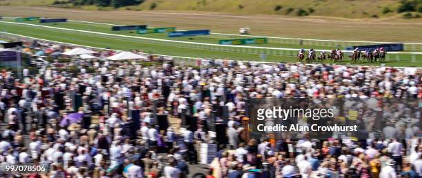 General view as runners race towards the finish at Newmarket Racecourse on July 12, 2018 in Newmarket, United Kingdom.