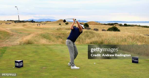 Ian Poulter of England takes his tee shot on hole eleven during day one of the Aberdeen Standard Investments Scottish Open at Gullane Golf Course on...