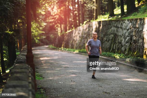 jogging - anandabgd stock pictures, royalty-free photos & images