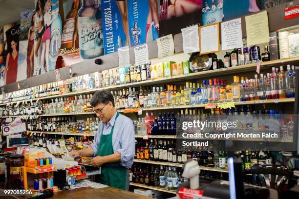 liquor shelf, san francisco, california - corner shop stock-fotos und bilder