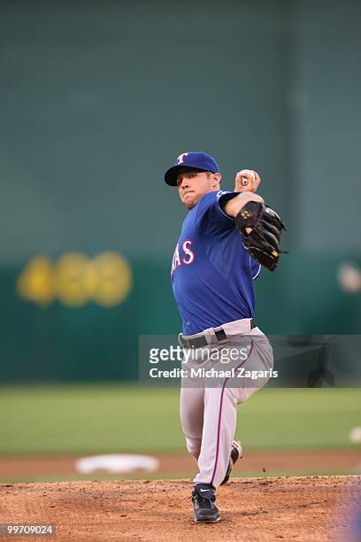 Rich Harden of the Texas Rangers pitching during the game against the Oakland Athletics at the Oakland Coliseum on May 3, 2010 in Oakland,...