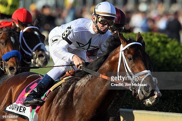 Kentucky Derby winner Super Saver, ridden by Calvin Borel, rounds turn 1 during the 135th running of the Preakness Stakes at Pimlico Race Course on...