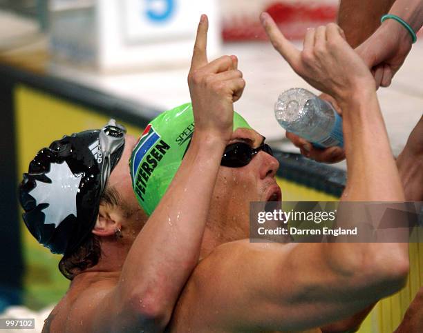 Brett Petersen of South Africa celebrates coming second during the men's 50 metre Breaststroke at the Chandler Aquatic centre during the Goodwill...