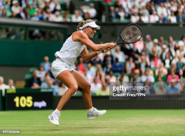 Angelique Kerber of Germany in action against Daria Kasatkina of Russia in the ladies' quarter final at the All England Lawn Tennis and Croquet Club...