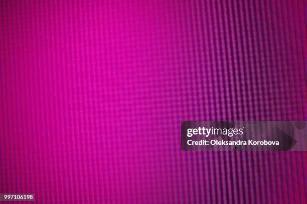 close-up of a colorful moire pattern on a computer screen. - magenta fotografías e imágenes de stock