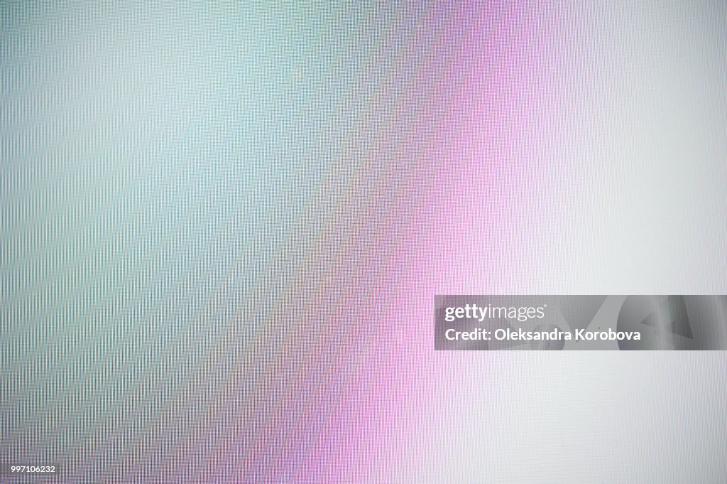 Close-up of a colorful moire pattern on a computer screen.