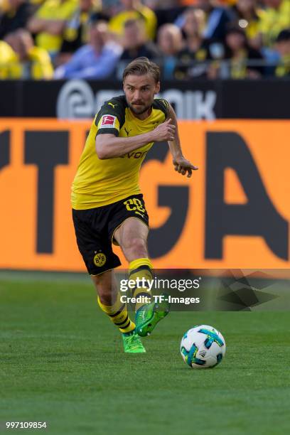 Marcel Schmelzer of Dortmund controls the ball during the Bundesliga match between Borussia Dortmund and 1. FSV Mainz 05 at Signal Iduna Park on May...