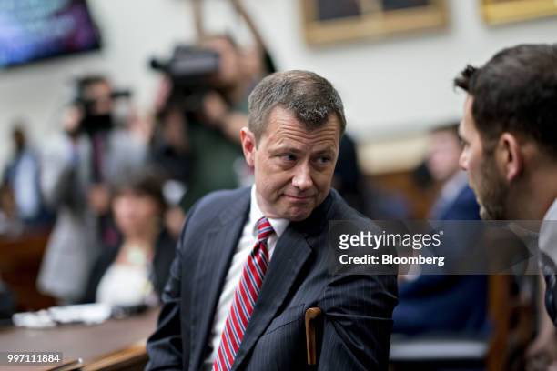 Peter Strzok, an agent at the Federal Bureau of Investigation , waits to begin a joint House Judiciary, Oversight and Government Reform Committees...
