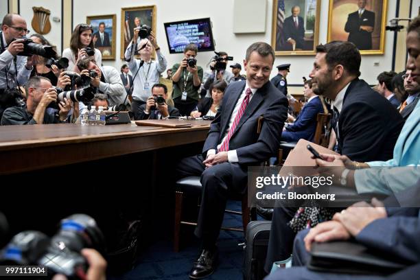 Peter Strzok, an agent at the Federal Bureau of Investigation , center, waits to begin a joint House Judiciary, Oversight and Government Reform...