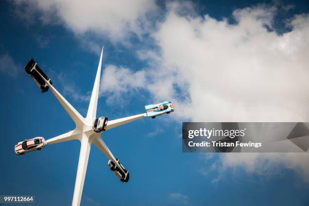 Classic racing cars form part of a large sculptural feature at the Goodwood Festival Of Speed at Goodwood on July 12, 2018 in Chichester, England.