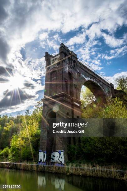 a bridge to the sunny skies - gr stock pictures, royalty-free photos & images