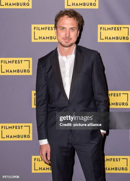 Actor Lars Eidinger arriving to the Passage Theatre for the screening of the film "Mathilde" in Hamburg, Germany, 08 October 2017. Photo: Daniel...