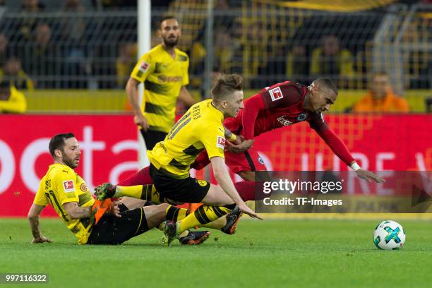 Marco Reus of Dortmund and Kevin-Prince Boateng of Frankfurt battle for the ball during the Bundesliga match between Borussia Dortmund and Eintracht...