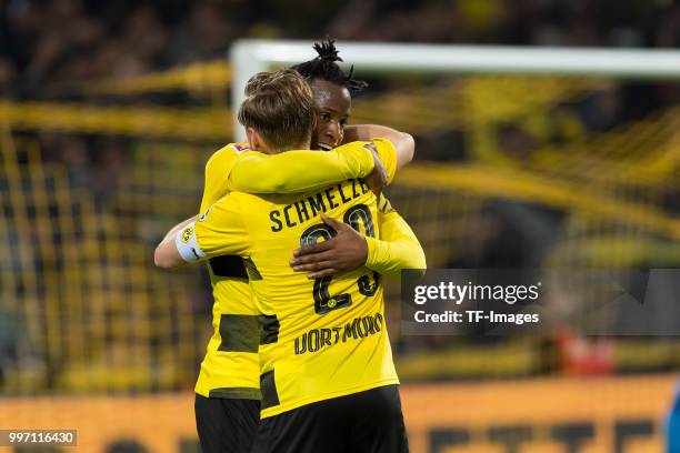 Michy Batshuayi of Dortmund celebrates after scoring his team`s third goal with Marcel Schmelzer of Dortmund during the Bundesliga match between...