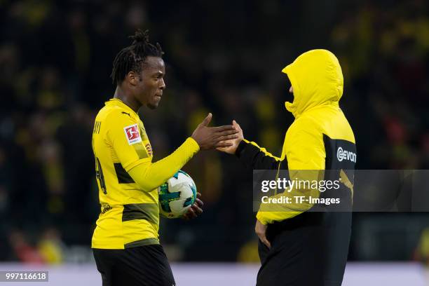 Michy Batshuayi of Dortmund and Mahmoud Dahoud of Dortmund celebrate after winning the Bundesliga match between Borussia Dortmund and Eintracht...