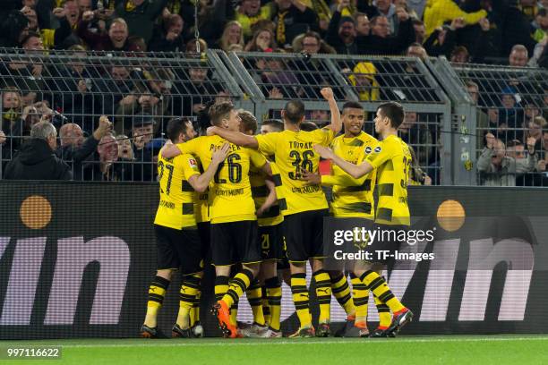 Michy Batshuayi of Dortmund celebrates after scoring his team`s third goal with team mates during the Bundesliga match between Borussia Dortmund and...