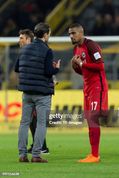 Head coach Niko Kovac of Frankfurt speaks with Kevin-Prince Boateng of Frankfurt during the Bundesliga match between Borussia Dortmund and Eintracht...