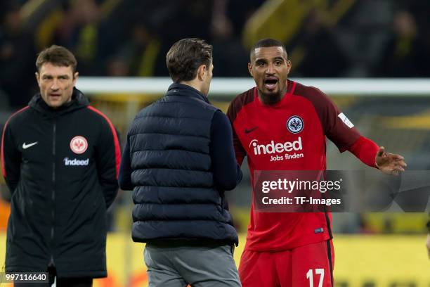 Head coach Niko Kovac of Frankfurt speaks with Kevin-Prince Boateng of Frankfurt during the Bundesliga match between Borussia Dortmund and Eintracht...