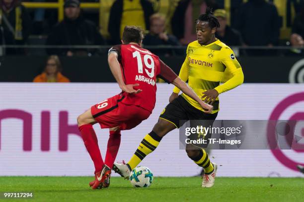 David Abraham of Frankfurt and Michy Batshuayi of Dortmund battle for the ball during the Bundesliga match between Borussia Dortmund and Eintracht...