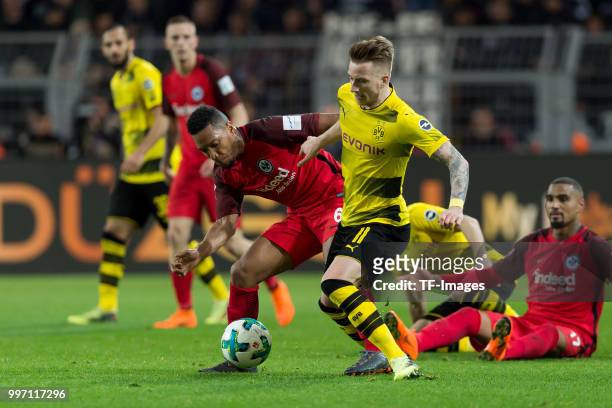 Jonathan de Guzman of Frankfurt and Marco Reus of Dortmund battle for the ball during the Bundesliga match between Borussia Dortmund and Eintracht...