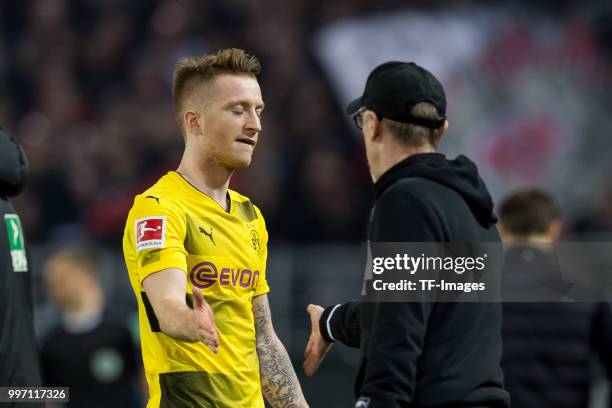 Marco Reus of Dortmund and Head coach Peter Stoeger of Dortmund gesture during the Bundesliga match between Borussia Dortmund and Eintracht Frankfurt...