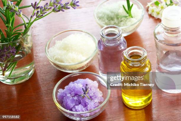 bath salt with aromatherapy oil - bath salt stock-fotos und bilder