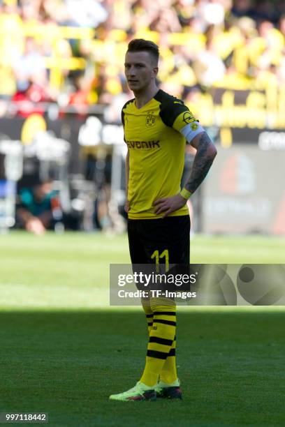 Marco Reus of Dortmund looks on during the Bundesliga match between Borussia Dortmund and 1. FSV Mainz 05 at Signal Iduna Park on May 5, 2018 in...