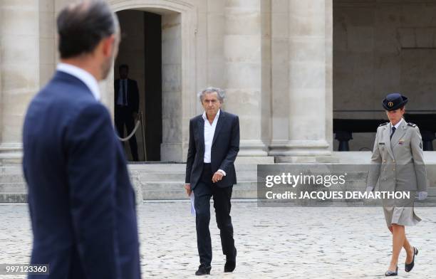 French philosopher and writer Bernard-Henri Levy arrives to take part in a tribute ceremony to French filmmaker and writer Claude Lanzmann on July 12...