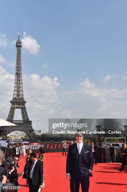 Actor Tom Cruise poses in front of the Eiffel Tower during the 'Mission: Impossible - Fallout' Global Premiere in Paris on July 12, 2018 in Paris,...