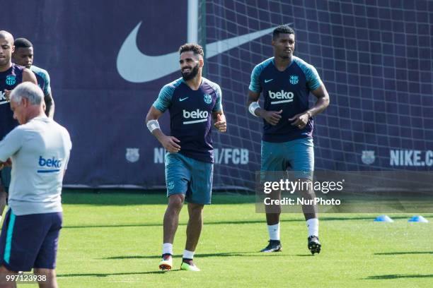 Douglas Pereira from Brasil of FC Barcelona and Marlon Santos from Brasil of FC Barcelona during the first FC Barcelona training session of the...