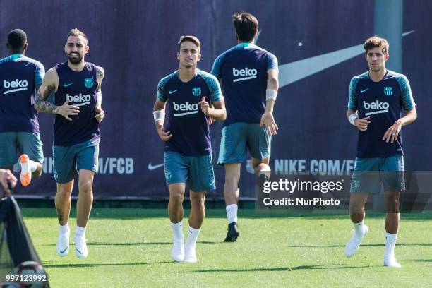 Paco Alcacer from Spain of FC Barcelona, Denis Surez from Spain of FC Barcelona and Sergi Roberto from Spain of FC Barcelona during the first FC...