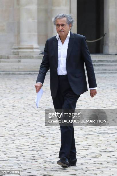 French philosopher and writer Bernard-Henri Levy arrives to take part in a tribute ceremony to French filmmaker and writer Claude Lanzmann on July 12...