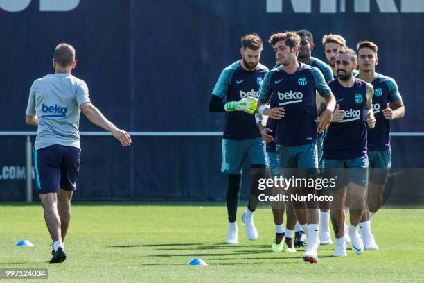 Sergi Roberto from Spain and Paco Alcacer from Spain during the first FC Barcelona training session of the 2018/2019 La Liga pre season in Ciutat...