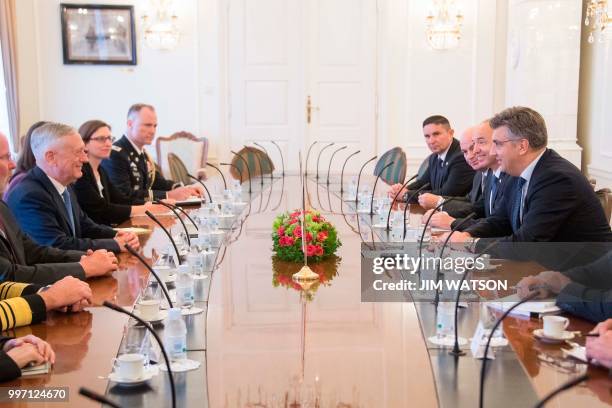 Secretary of Defense James Mattis smiles after signing the guest book before meeting with Croatian Prime Minister Andrej Plenkovic in Zagreb, Croatia...
