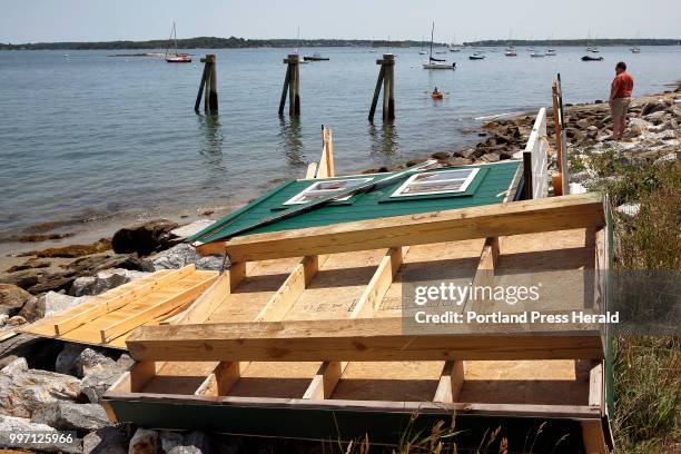 Recently installed City Park Ranger station lies in ruin near East End Beach on Wednesday, a day after a fierce, but abrupt storm storm cut a swath...