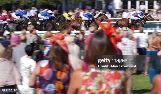 John Egan riding Naval Intelligence win The Edmondson Hall Solicitors Sir Henry Cecil Stakes at Newmarket Racecourse on July 12, 2018 in Newmarket,...