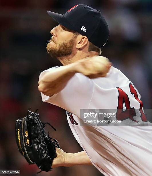 Boston Red Sox starting pitcher Chris Sale fires a pitch. The Boston Red Sox host the Texas Rangers in a regular season MLB baseball game at Fenway...