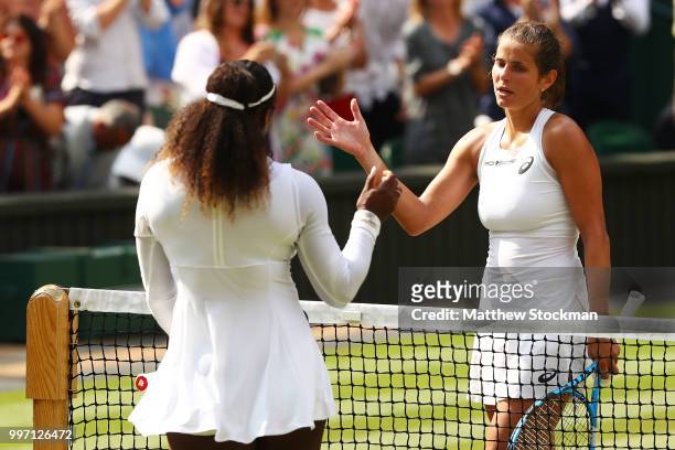 Serena Williams of The United States shakes hands with Julia Goerges of Germany after their Ladies' Singles semi-final match on day ten of the...