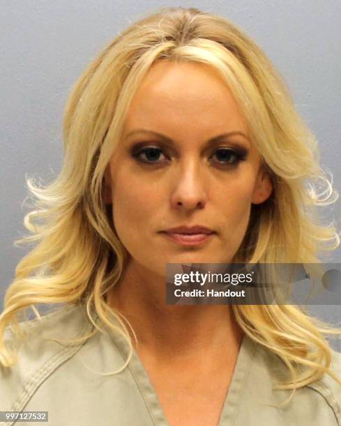 In this handout provided by Franklin County Sheriff's Office, adult film actress Stephanie Clifford aka Stormy Daniels poses for a mugshot photo...