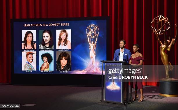 Actors Samira Wiley and Ryan Eggold speak on stage at the nominations announcement for the 70th Emmy Awards, July 12, 2018 at the Television...