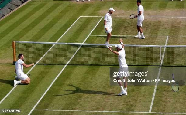 Jack Sock and Mike Bryan celebrate their doubles win against Dominic Inglot and Franko Skugor on day ten of the Wimbledon Championships at the All...