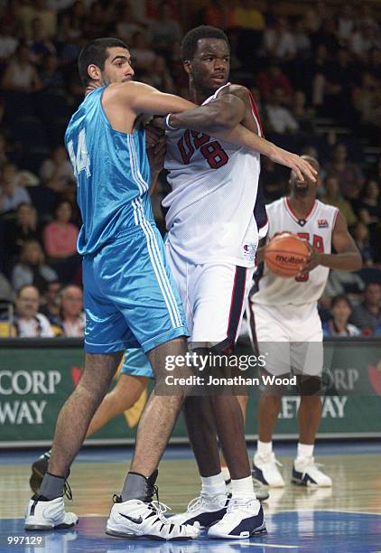 Jermaine O''Neal of the USA clashes with Pedro Calderon of Agentina during the Mens Basketball match between the USA and Argentina, played at the...